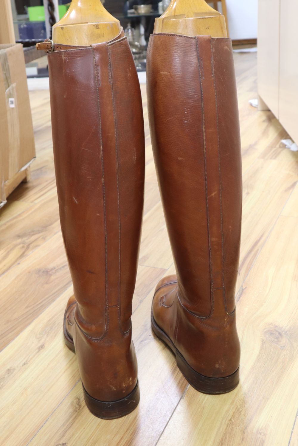 A pair of gentlemans leather riding boots, with shoe-trees, by W.Taylor, Great Portland Street, boot height 48cm